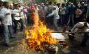 thumb for Indian Muslims burn effigy of US President Bush during protest rally in Mumbai